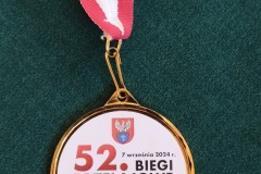 zdjęcie przedstawia medal 52 biegów przełajowych o Puchar Prezydenta Legionowa